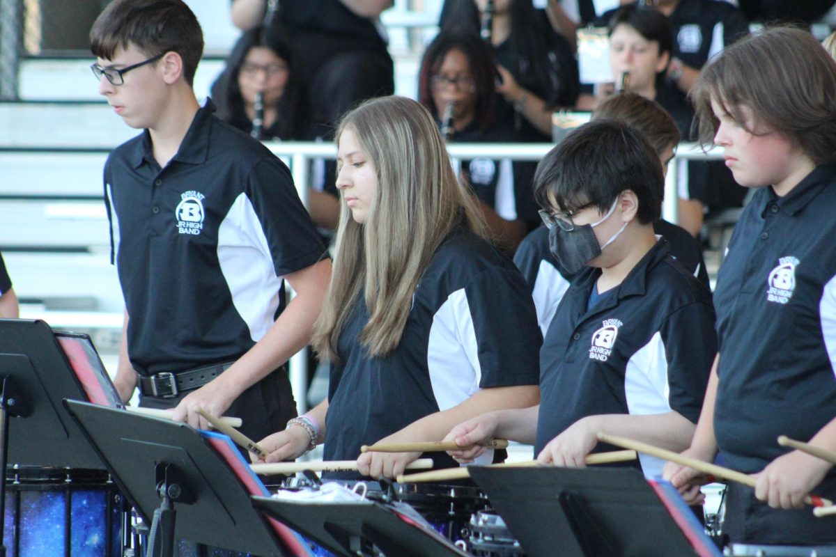 Band members play at the halftime show. Photo: Lexie Metheny