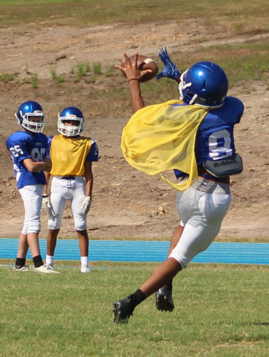 Freshman football players practice in August. Photo: Xoe Hawkins